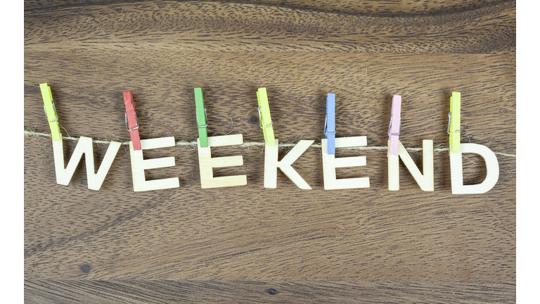 Colorful Wooden clothespins, clothes pegs with Letters Saying WEEKEND