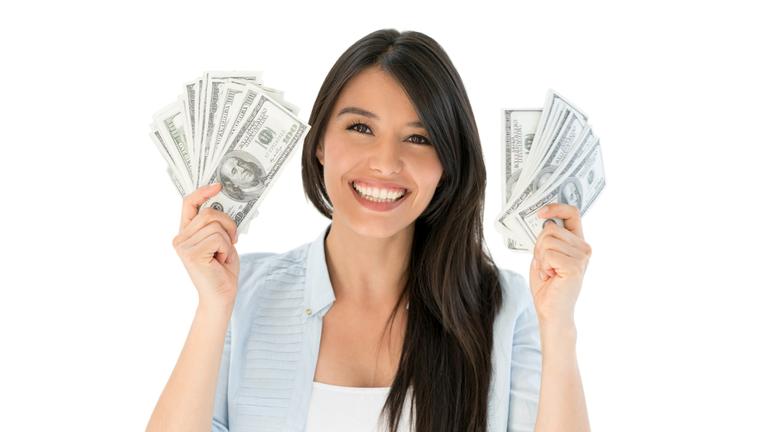 Very happy woman holding cash