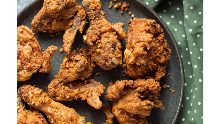 Fried garlic butter chicken on a dining table