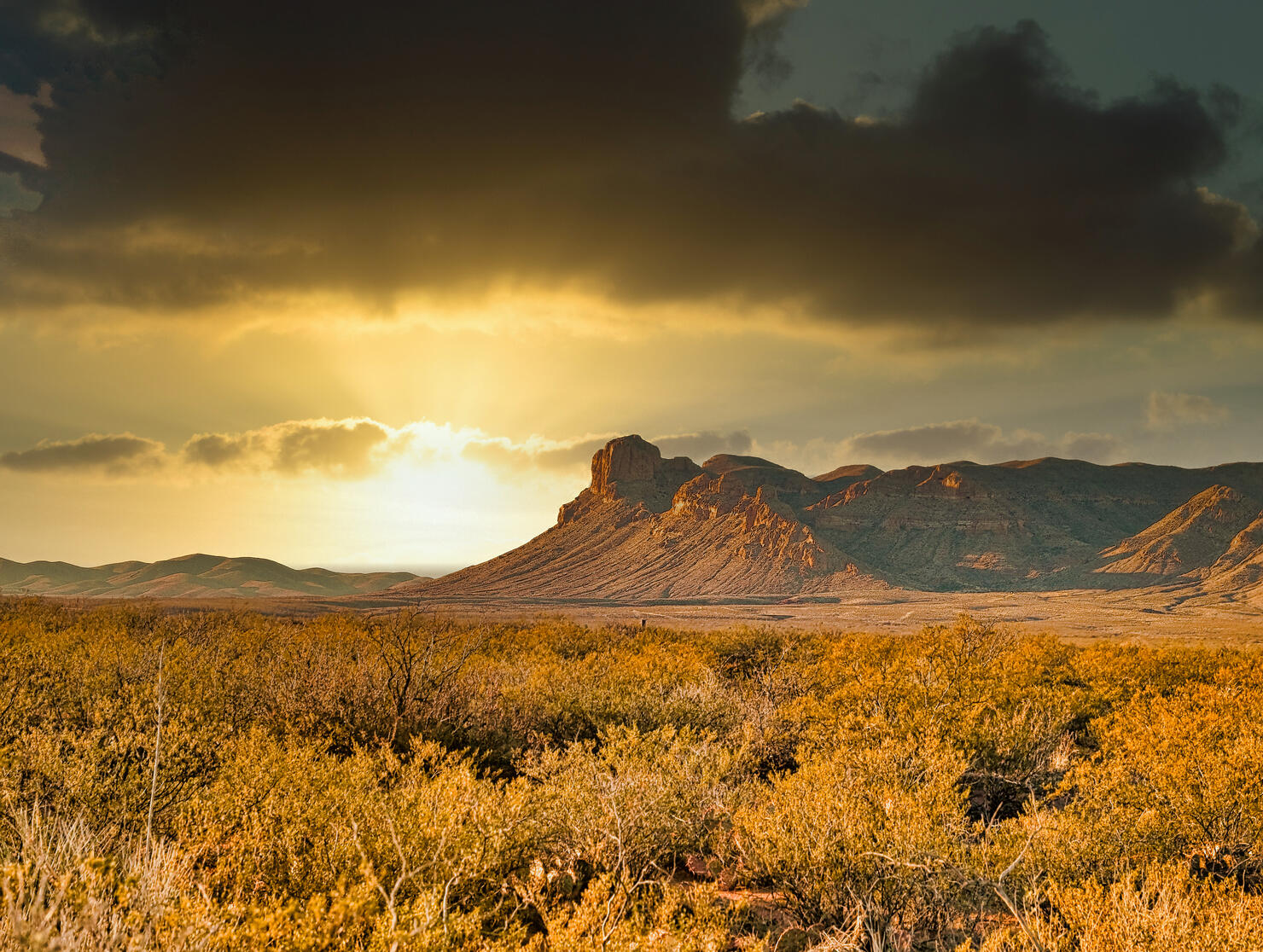 Dark Storm Cloud Over Mountain During Sunset in West Texas