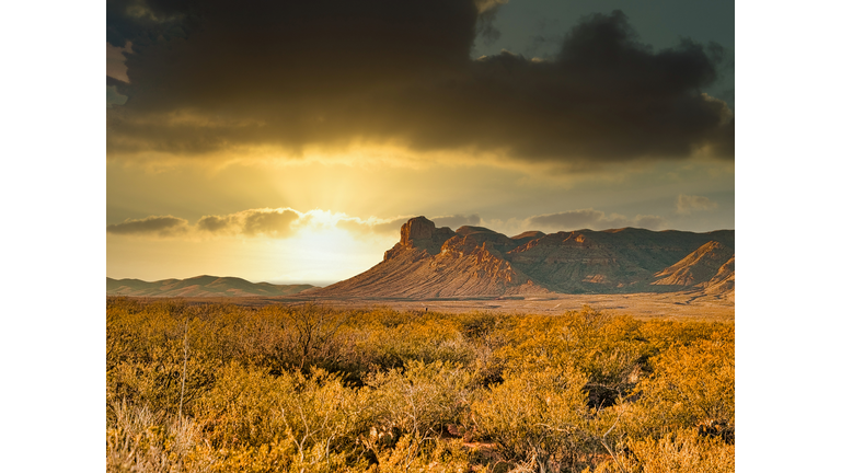 Dark Storm Cloud Over Mountain During Sunset in West Texas