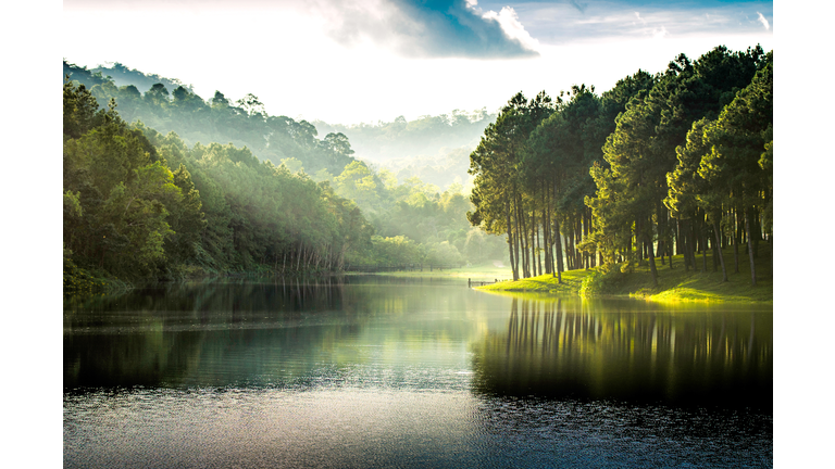 Beatiful nature lake and forest , Pang oung lake and pine forest in Mae Hong Son , Thailand , nature landscape of Thailand . Pang oung is popular travel destination in Thailand