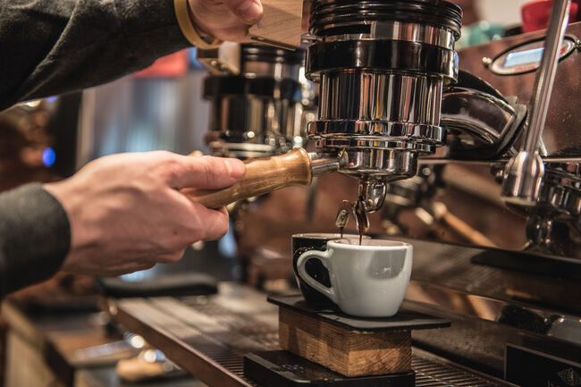 Cropped Image Of Barista Making Coffee At Cafe