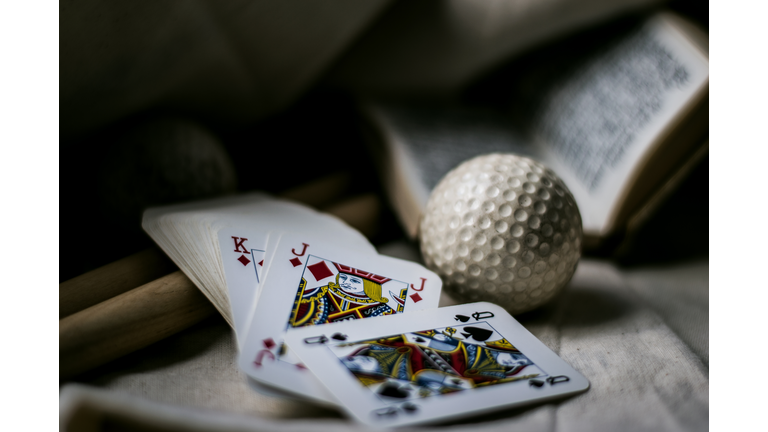 Close-Up Of Playing Cards By Ball