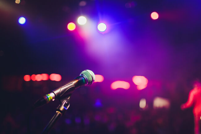 microphone against blur on beverage in pub and restaurant background.