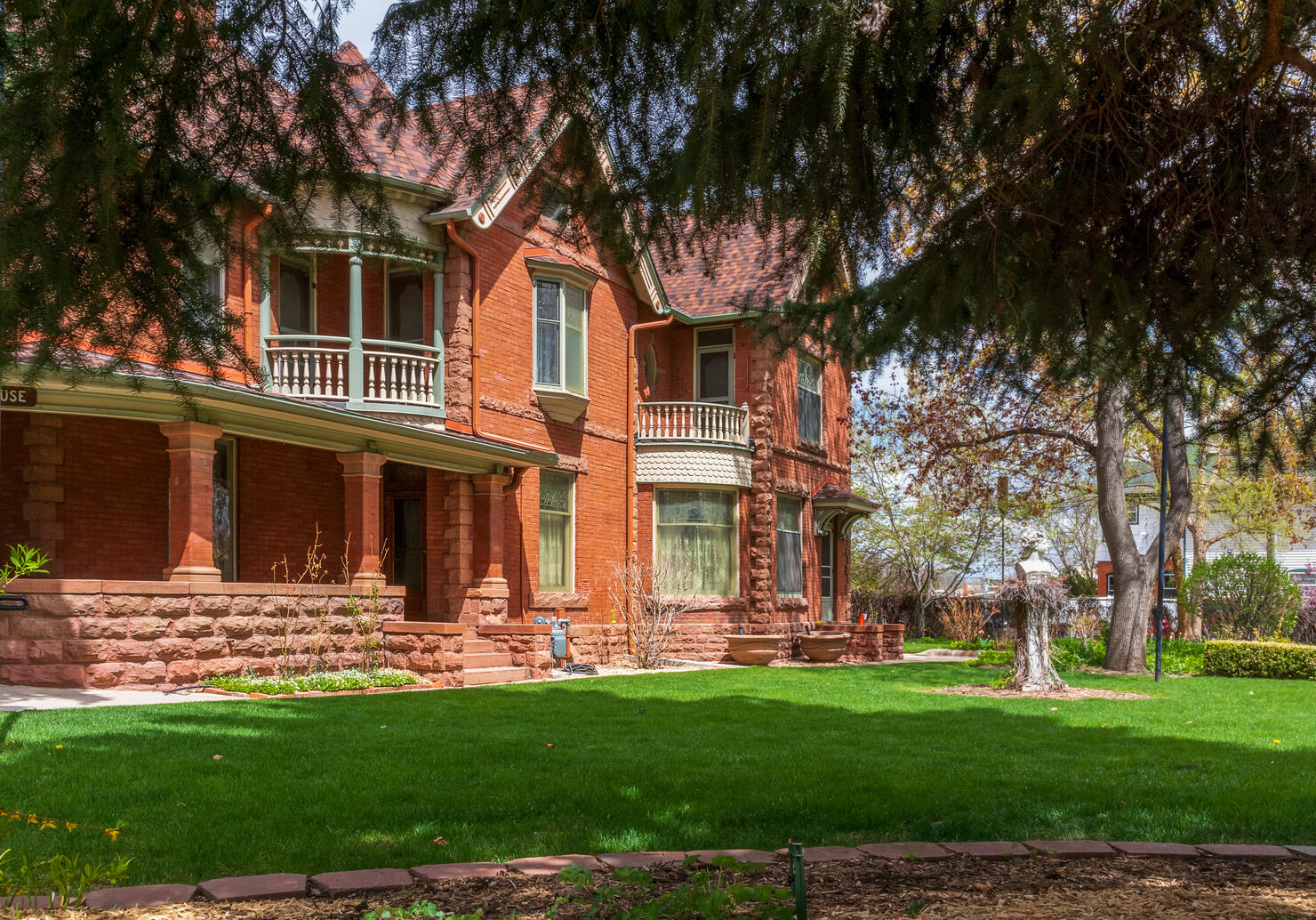 Longmont, Colorado - May 8, 2021: Callahan House - 1892 Queen Anne-style house, a popular event venue, with ornate woodwork and an Italianate garden in Longmont, Colorado