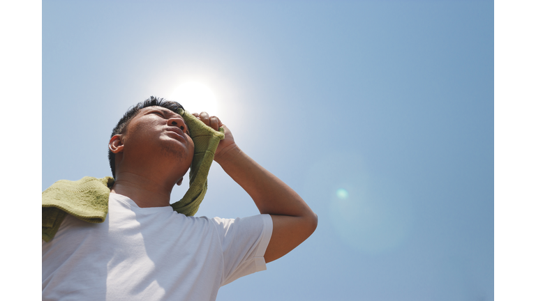 Young man and heat stroke.