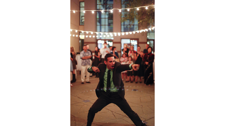 Man dancing at wedding reception