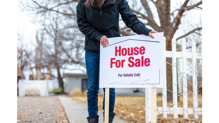 Female In Residential Housing Area Home for Sale in America