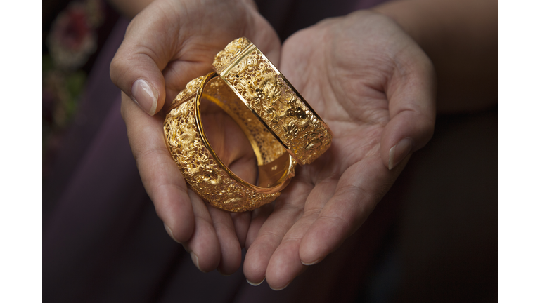 Solid gold wedding bracelets with Chinese character for luck