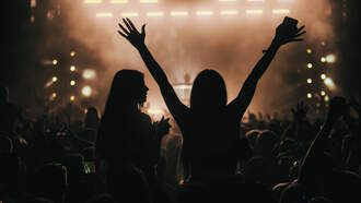 Woman Finds Creative Way to Sneak Wine into Concert 