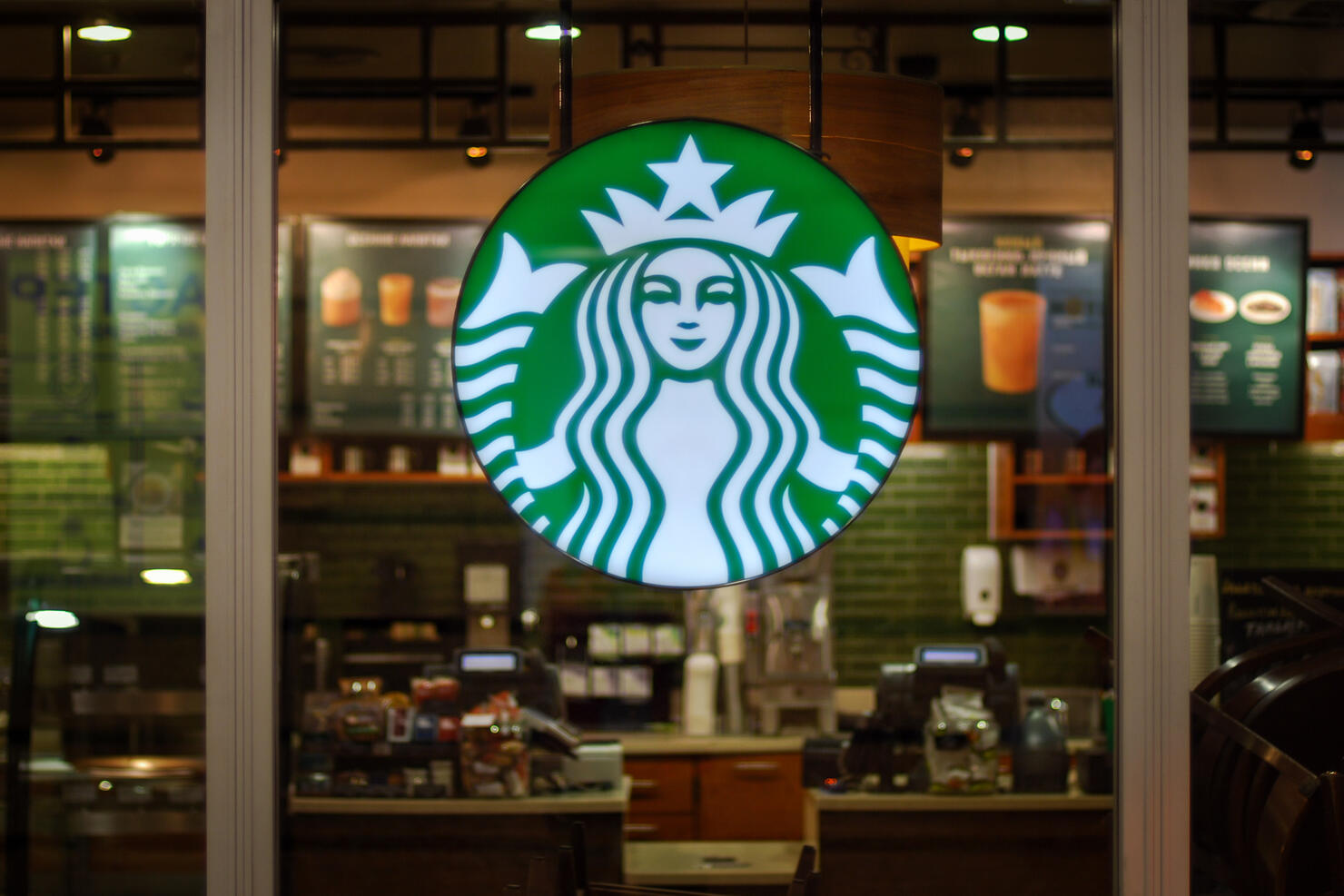 Starbucks cafe interior - empty cafeteria behind glass wall