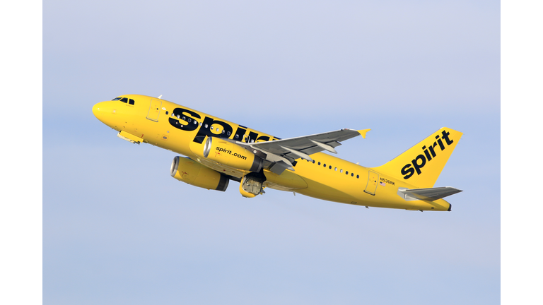 Spirit Airlines Airbus A319 aircraft taking off at LAX Airport.