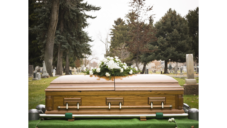 coffin at a cemetery