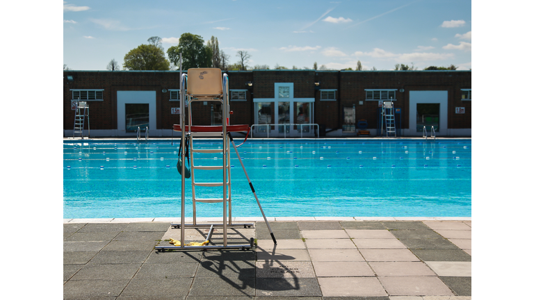 Lido - outside swimming pool with lifeguard chair in foreground