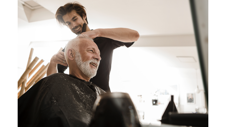 Senior man at hairdresser