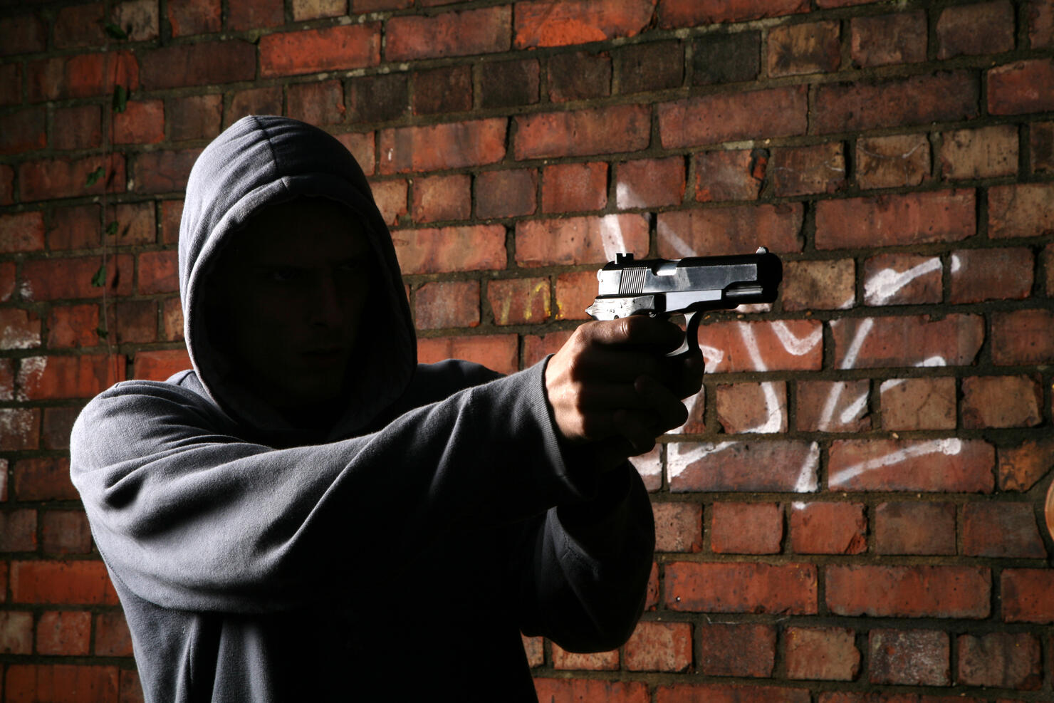 Faceless Gun Toting Hoodlum