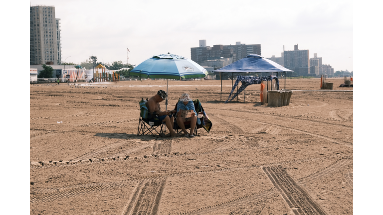 New Yorkers Enjoy The Summer Heat On Coney Island