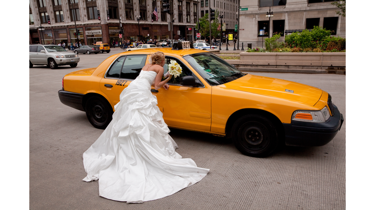 Bride and taxi