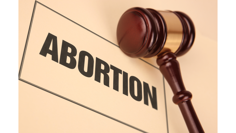 Abortion Document Near Judges Hammer / Gavel
