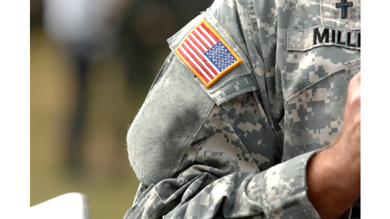 the American flag attached to the American military uniform.