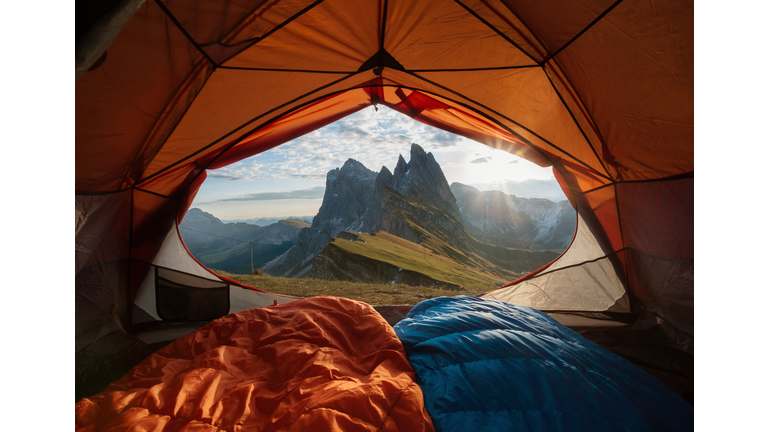 View from tent to the mountain. Sport and active life concept