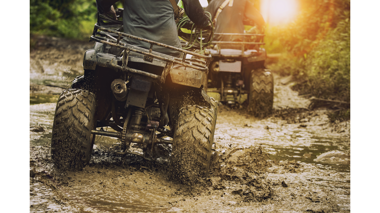 man riding atv vehicle on off road track ,people outdoor sport activitiies theme