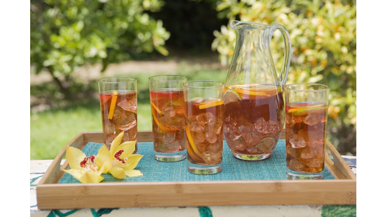 Pitcher and glasses of fruit iced tea