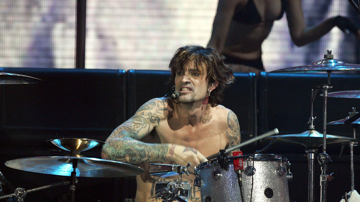 Motley Crue Drummer Tommy Lee Caught Faking It On Stage  FM 80s+ |  Morning Drive with Christie Live