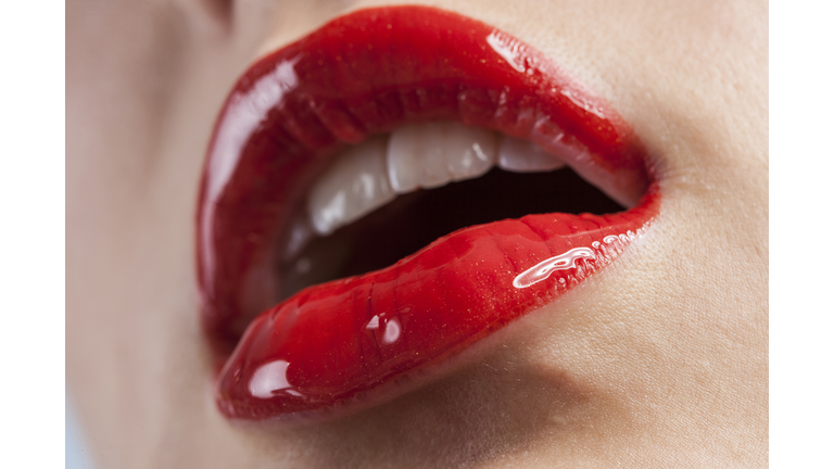 Woman's lips with red lipstick