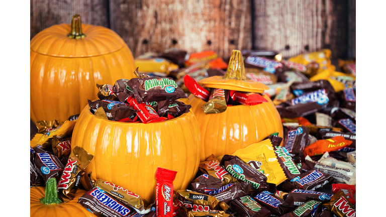 Decorative pumpkins filled with Halloween candy