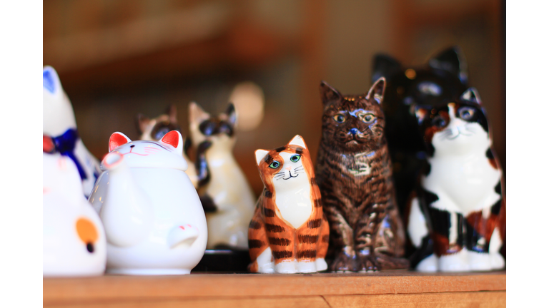 Cute Ceramic cats on shelf