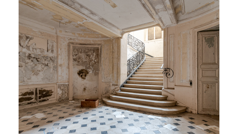 Spacious stairwell in a ruined empty castle