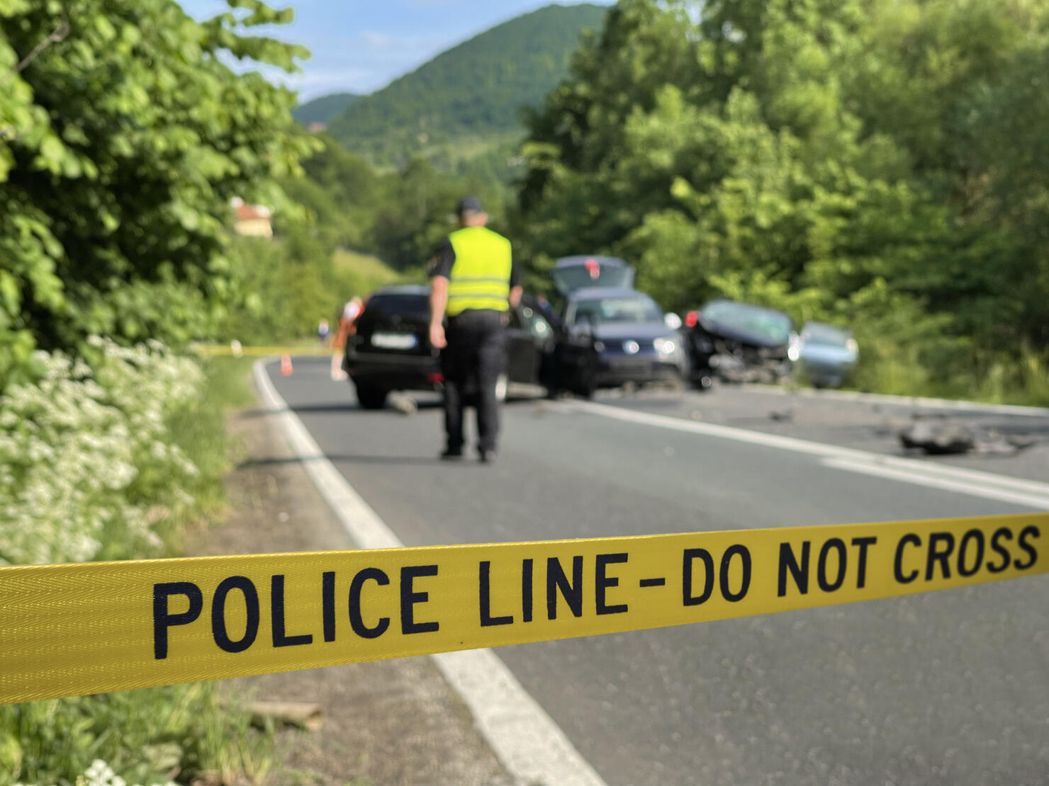 Police yellow line on traffic accident