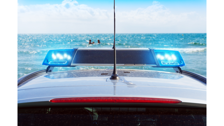 police patrol car on the beach