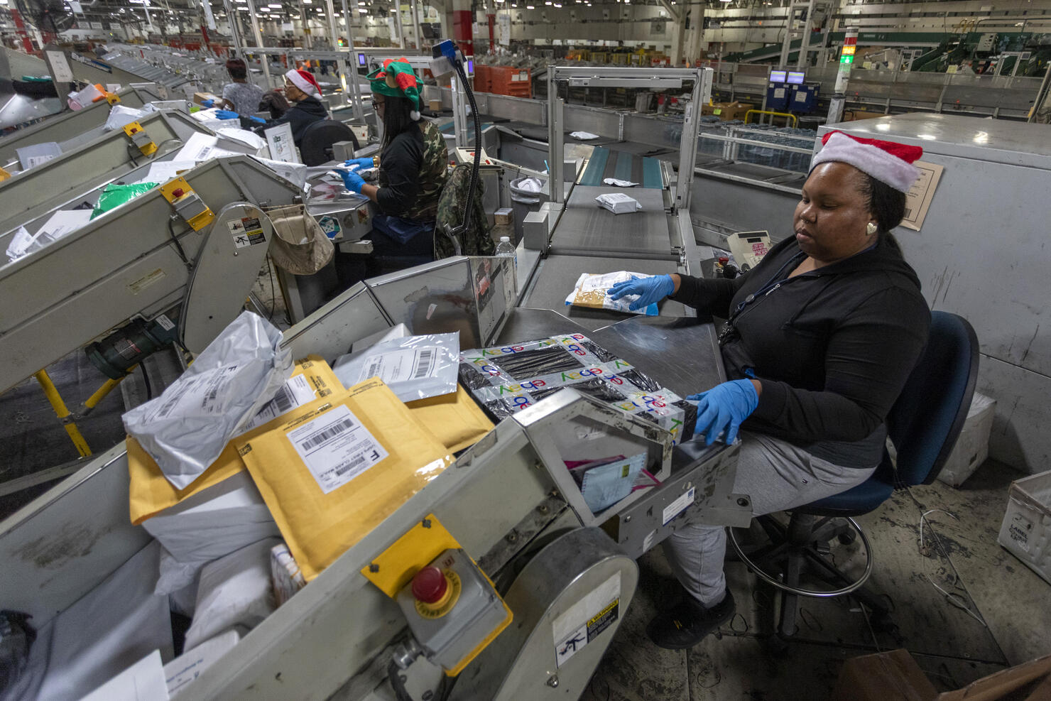U.S. Postal Service Processes Packages At Los Angeles Distribution Center During Holiday Season