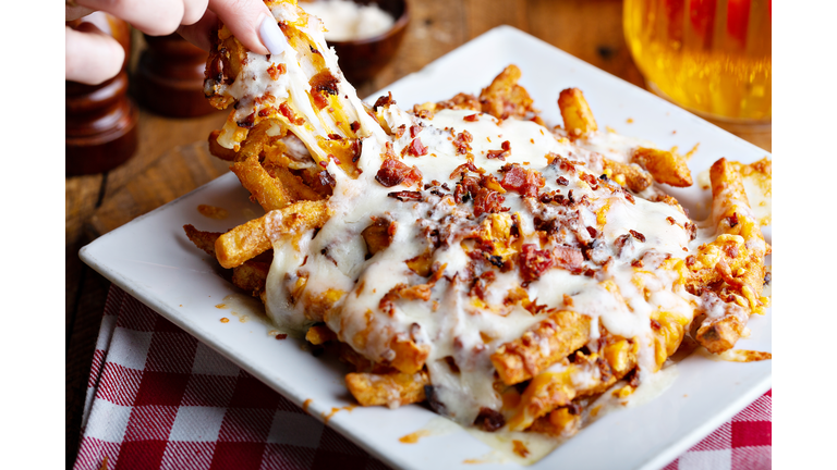 Cheese fries topped with bacon