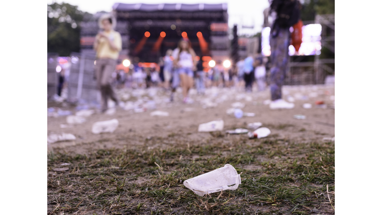 After party - empty glasses and garbage on the ground