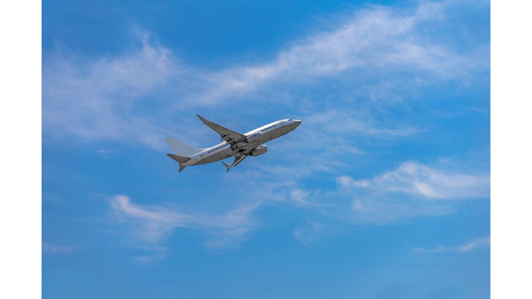 Passenger airplane taking off into the sky