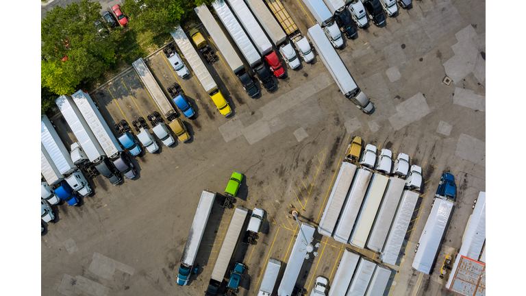 Aerial view of parking lot with trucks on transportation of truck rest area dock