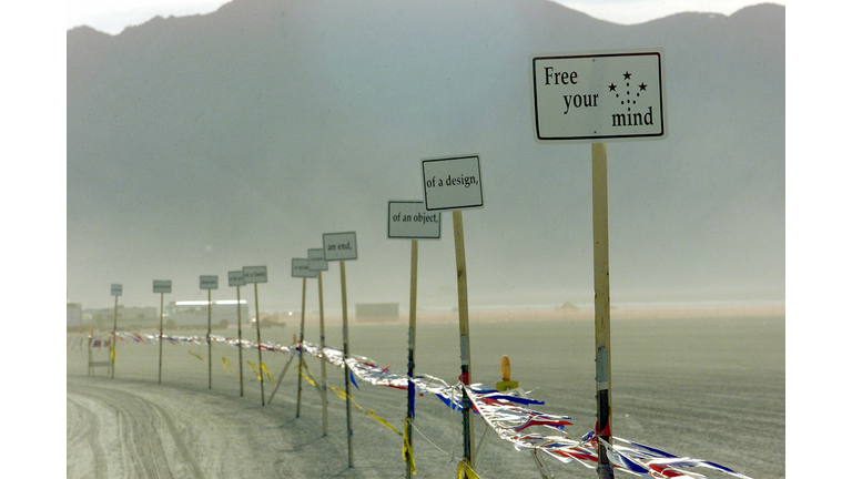 US-BURNING MAN-SIGNS