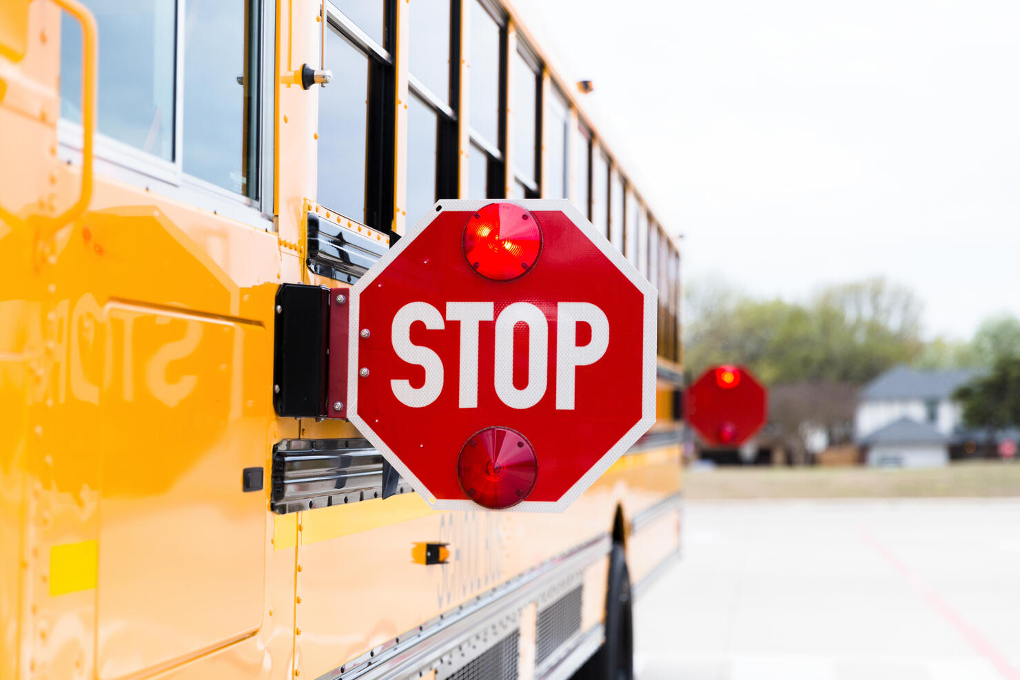 School bus with stop sign activated