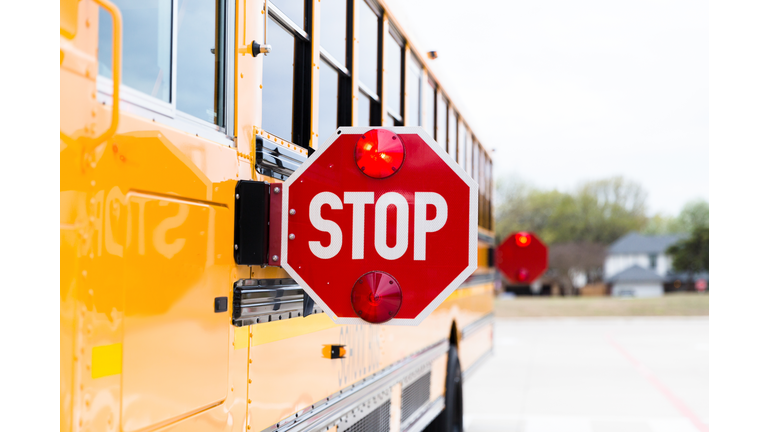 School bus with stop sign activated