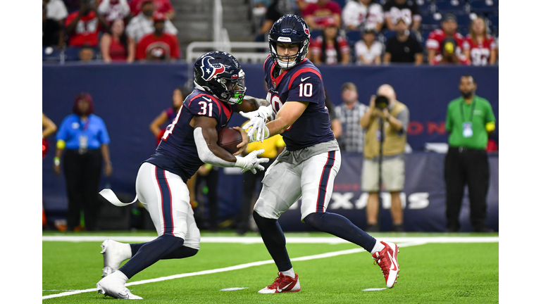 Texans rookies Thomas Booker, Kurt Hinish learned on the job in first NFL  start