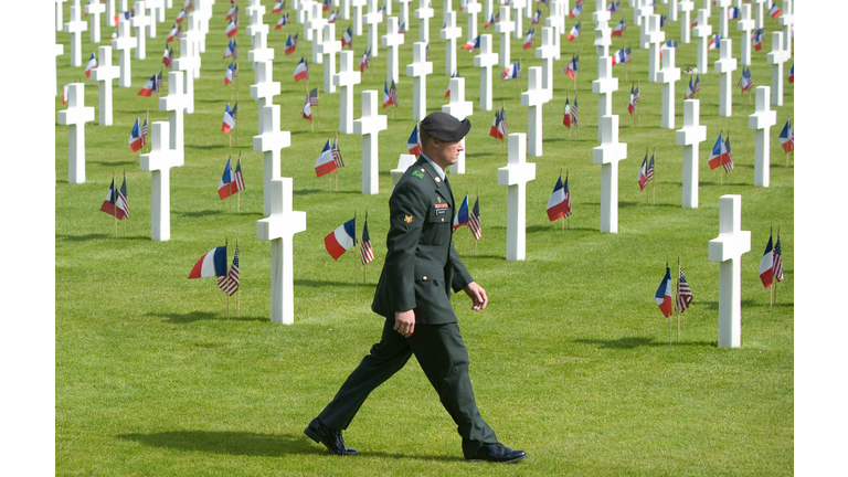 A member of the US Army walks through th