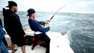 Father and Son Catch Whopper of a Swordfish