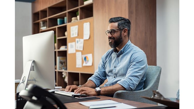 Creative man working on computer