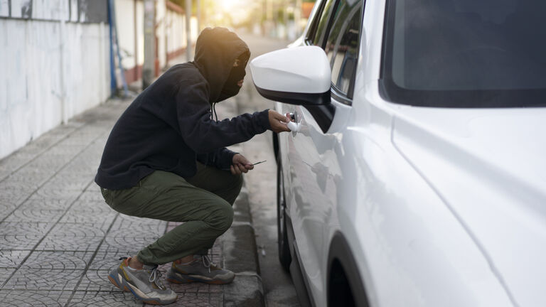 Man stealing a car