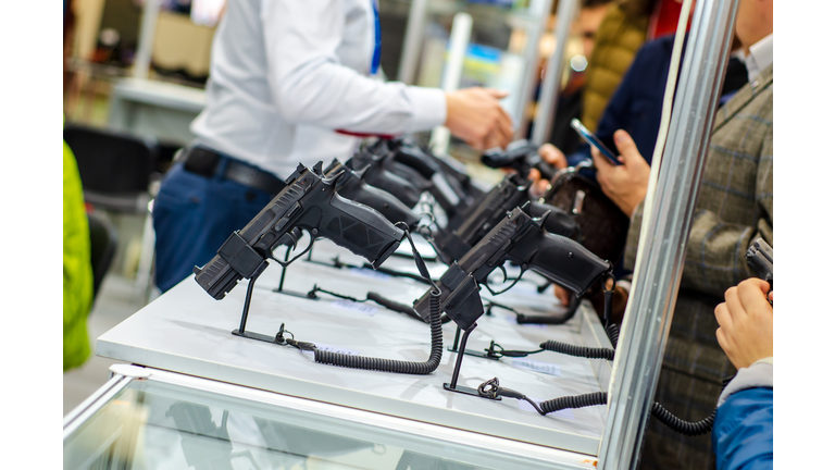 Gun Display Stands. Pistols for sale in the store.