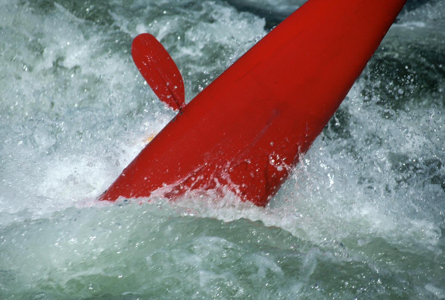Kayak Overturned in Whitewater Rapids
